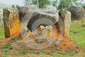 Ancient stone jars in a Plain of Jars Site 1 near Phonsavan, Xienghouang province, Laos.