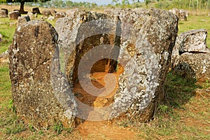 Ancient stone jars in a Plain of Jars Site #1 near Phonsavan, Xienghouang province, Laos.