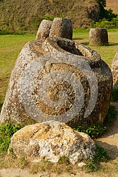 Ancient stone jars in a Plain of Jars Site #1 near Phonsavan, Xienghouang province, Laos.