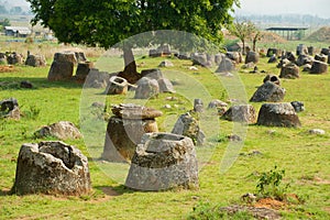 Ancient stone jars in a Plain of Jars Site #1 near Phonsavan, Xienghouang province, Laos.