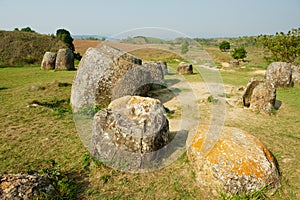 Ancient stone jars in a Plain of Jars Site #1 near Phonsavan, Xienghouang province, Laos.