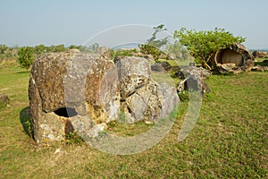 Ancient stone jars in a Plain of Jars Site #1 near Phonsavan, Xienghouang province, Laos.