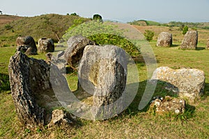 Ancient stone jars in a Plain of Jars Site #1 near Phonsavan, Xienghouang province, Laos.