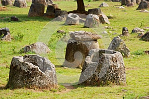 Ancient stone jars in a Plain of Jars Site #1 near Phonsavan, Xienghouang province, Laos.