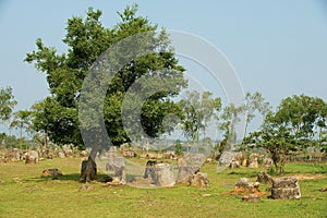 Ancient stone jars in a Plain of Jars Site #1 near Phonsavan, Xienghouang province, Laos.