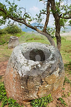 Ancient stone jars in a Plain of Jars Site #2 near Phonsavan, Xienghouang province, Laos.