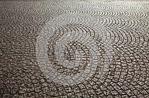 Ancient stone roadbed as background photo