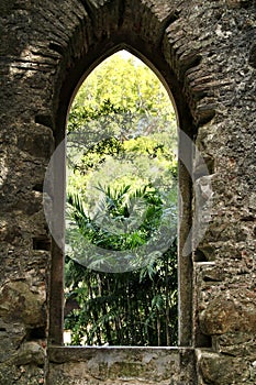 Ancient stone ruins in a leafy garden of Sintra