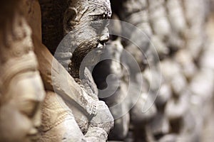 Ancient stone sculpture in Angkor Wat. Cambodia.