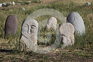 Ancient stone sculptures near Old Burana tower located on famous