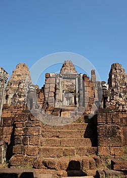 Ancient stone staircase. Sandstone steps. The ruins of eastern Mebon