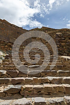 Ancient stone stairs in an inka temple in Ollantaytambo, Peru