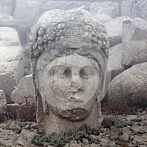 Ancient stone statue on the top of Nemrut mount, Turkey