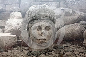 Statue of goddess of Commagene Tyche-Bakht on the top of Nemrut mount, Anatolia, Turkey photo