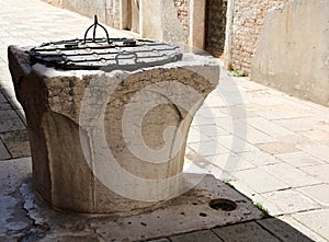 Ancient stone well for rainwater collection