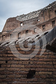 Ancient stones of the interior of the Colosseum in Rome