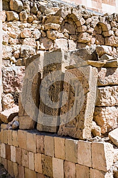 Ancient khachkars on the monastery wall, Armenia, Noravank.