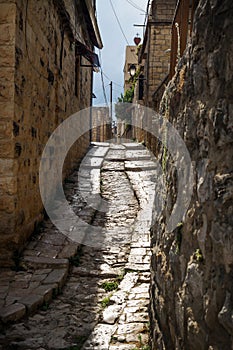 Ancient streets in traditional town Deir el Qamar in vertical position, Lebanon