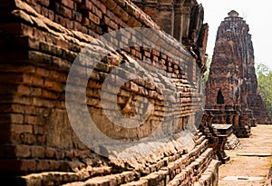 Ancient stupa , pagoda in archaeological site at Wat Mahathat temple . old sculpture in history is a world heritage