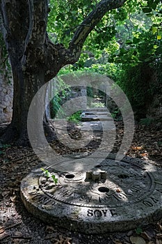 Ancient Sundial Casting Times Tale in a Forgotten Garden The shadow blurs with the hours