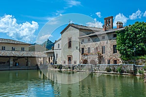 Ancient swimming pool with thermal water in Bagno Vignoni, Tuscany