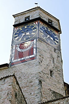 Ancient Swiss castle Rapperswil with colorful sundial