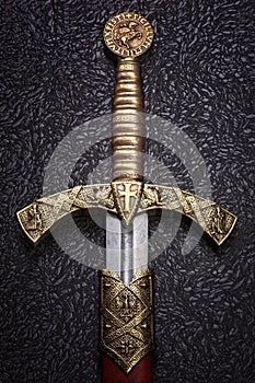 Ancient sword on a beautiful dark background