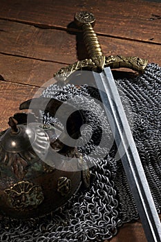 Ancient sword, chain armor and the soldier's helmet with horns