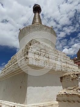 Ancient tall white stupa of the monastery of Shey in Ladakh, India.