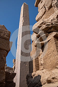 Ancient Temple of Karnak in Luxor - Ruined Thebes Egypt. Obelisk  at Karnak Temple of Amon-Ra