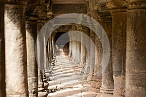 Ancient Temple Pillars Under a Walkway in Angkor Thom, Cambodia