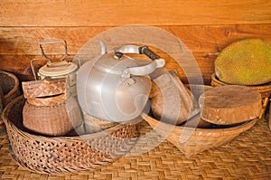 Ancient Thai kitchenwares on bamboo mat