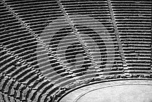 Ancient theater Epidaurus, Argolida, Greece side-view on rows in B&W photo