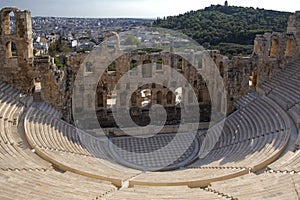Ancient theatre of Herodes Atticus is a small building of ancient Greece used for public performances of music and poetry, below