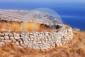 Ancient Thera ruins overlooking Santorini airport