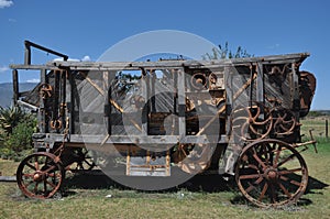 Ancient threshing machine photo