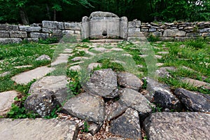 Ancient tiled dolmen in the valley of the river Jean. Monument of archeology megalithic structure