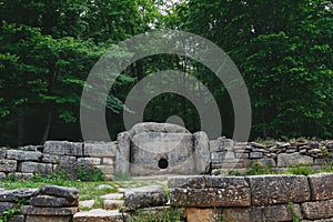 Ancient tiled dolmen in the valley of the river Jean. Monument of archeology megalithic structure