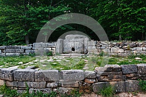 Ancient tiled dolmen in the valley of the river Jean. Monument of archeology megalithic structure