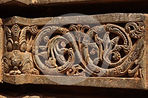 Ancient times intricate architecture stone carving at somnathpura temple india photo
