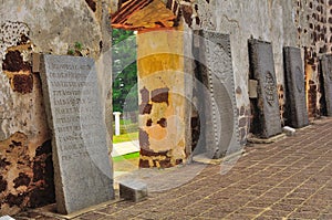 Ancient tombstones at church ruins