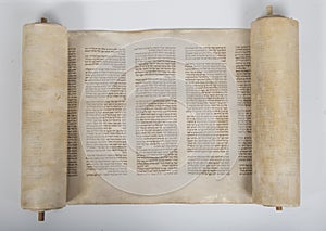 An ancient torah scroll on white background