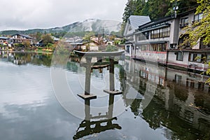 Ancient Torii gate at Kinrin Lake, Yufuin, Oita, Kyushu