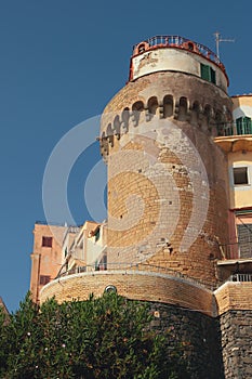 Ancient tower in city. Nettuno, Lazio, Italy