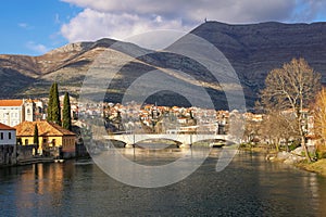 Ancient town on banks of river. Bosnia and Herzegovina, Republika Srpska. View of Trebisnjica river and Trebinje city