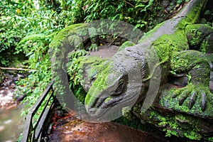 Ancient traditional balinese statue lizard. Ubud