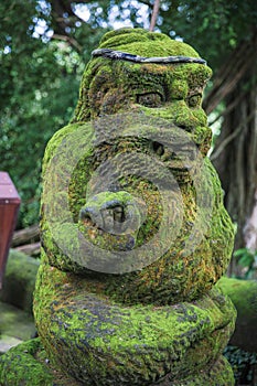 Ancient traditional balinese statue. Ubud