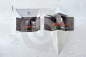 The ancient traditional window. Zuoz, Switzerland