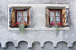 The ancient traditional window. Zuoz, Switzerland