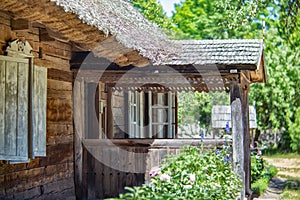 Ancient traditionnal baltic house with a porch.